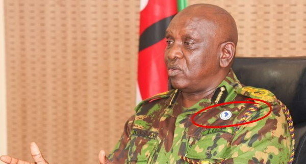 What IG Kanja’s New Lapel Button Means