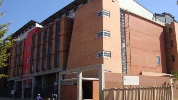 Mother accused of pimping daughters says court orderlies made her smuggle drugs into prison