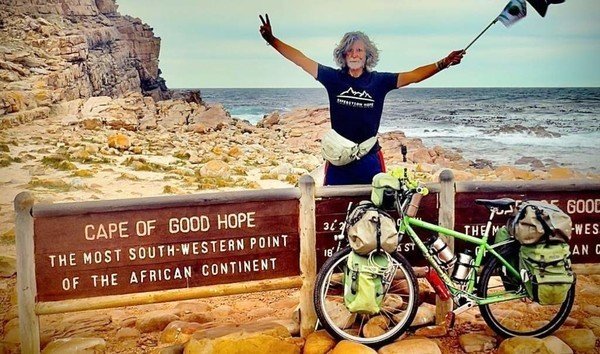 Cyclist completes 18-month ‘climate mission’ pedal from Berlin to Cape of Good Hope