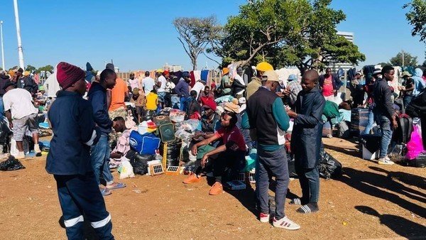 ‘They don’t want us anymore’: Migrants flock to shuttered Durban repatriation centre