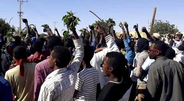 What prompted the protests in Sudan? 