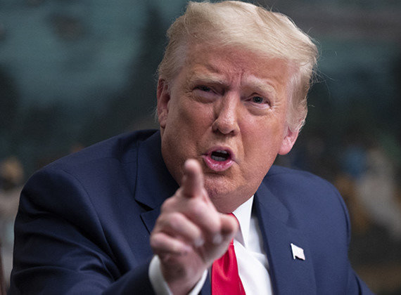 Trump signs order to pull US from WHO